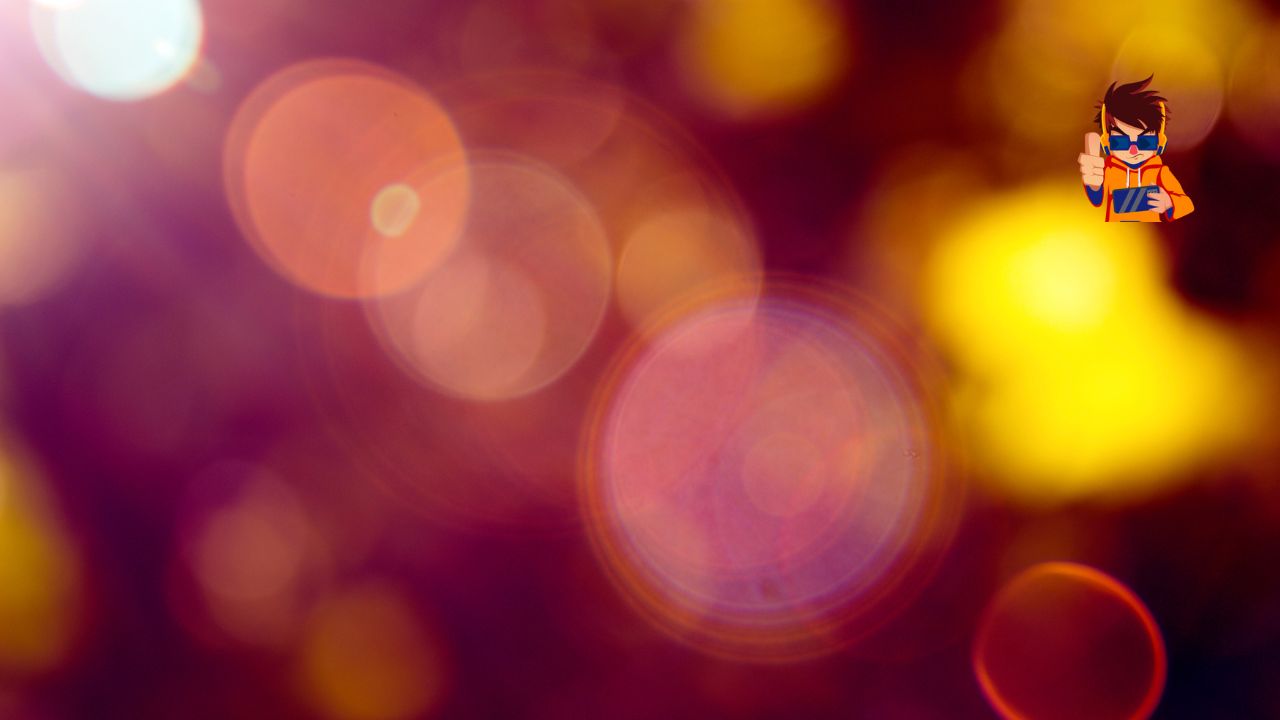 A dreamy bokeh effect featuring vibrant shades of yellow, orange, and purple, evoking a sense of nostalgia and warmth.